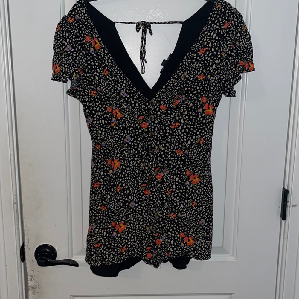 Forever 21 black romper with floral accents, size large.